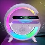 G-Shaped RGB LED Table Lamp with integrated wireless charger and Bluetooth speaker.