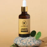 Bottle of Ostruce Enhanced Ostrich Oil with highlighted benefits for pain relief.