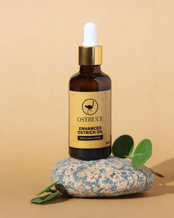 Bottle of Ostruce Enhanced Ostrich Oil with highlighted benefits for pain relief.