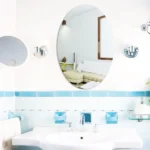 Oval Acrylic Mirror Wall Sticker for modern bathroom and home decor with reflective silver finish.